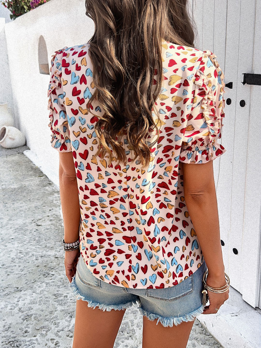 Heart print ruffled sleeve top