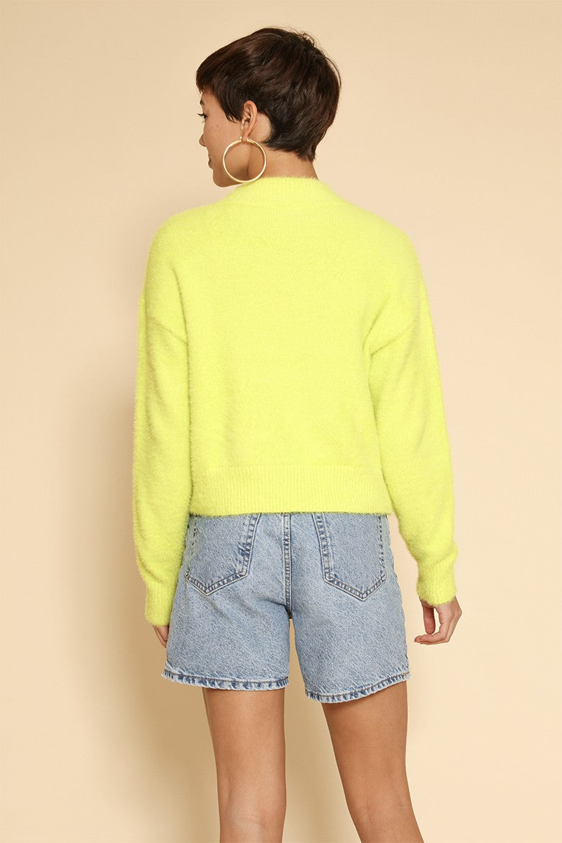 Cropped fuzzy bow sweater